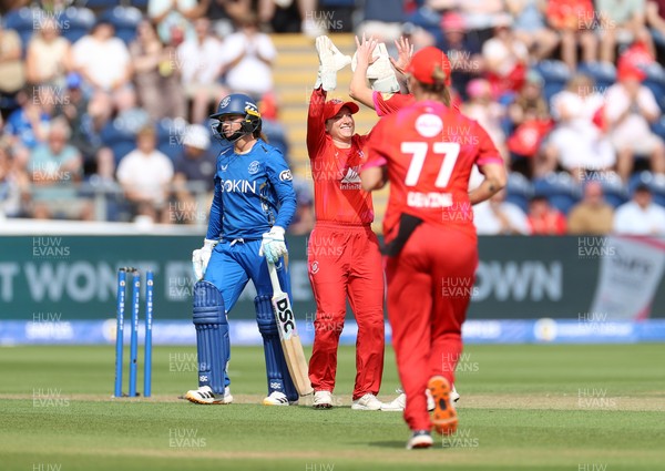 250726 - Welsh Fire Women v MI London Women - The Hundred - Rhianna Southby of Welsh Fire celebrates after Danni Wyatt-Hodge was bowled by Grace Potts