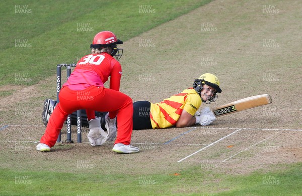 060821 - Welsh Fire Women v Trent Rockets Women, The Hundred - Katherine Brunt of Trent Rockets looks back at Sarah Taylor of Welsh Fire after slipping on the wicket