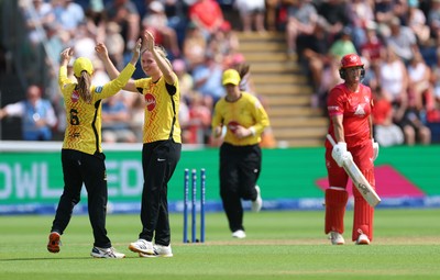290726 - Welsh Fire Women v Trent Rockets Women, The Hundred - Charley Phillips of Trent Rockets celebrates as she dismisses Sophie Devine of Welsh Fire