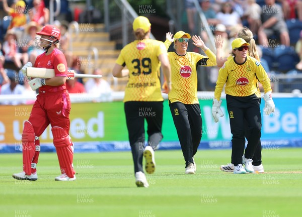 290726 - Welsh Fire Women v Trent Rockets Women, The Hundred - Trent Rockets celebrate as they take the wicket of Georgia Voll of Welsh Fire