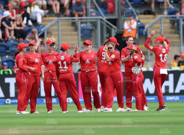 290726 - Welsh Fire Women v Trent Rockets Women, The Hundred - Welsh Fire celebrate after taking the wicket of Beth Mooney of Trent Rockets