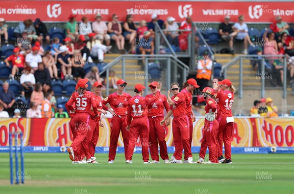 290726 - Welsh Fire Women v Trent Rockets Women, The Hundred - Welsh Fire celebrate after taking the wicket of Beth Mooney of Trent Rockets