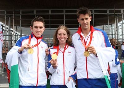 26.08.08 Wales gold medal winners at celebration as Wales' Olympic athletes arrive at the National Assembly's Sennedd building in Cardiff Bay L-R: Geriant Thomas, Nicole Cooke, Tom James 