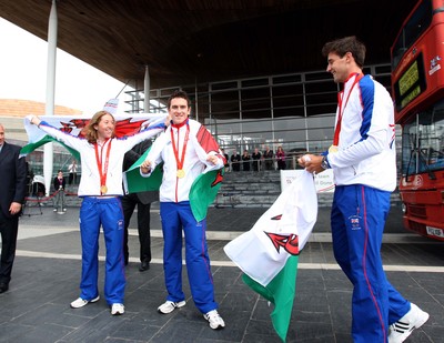 26.08.08 Wales gold medal winners at celebration as Wales' Olympic athletes arrive at the National Assembly's Sennedd building in Cardiff Bay L-R: Nicole Cooke, Geriant Thomas, Tom James 