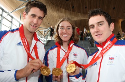 26.08.08 Wales gold medal winners at celebration as Wales' Olympic athletes arrive at the National Assembly's Sennedd building in Cardiff Bay L-R: Tom James, Nicole Cooke and Geriant Thomas 