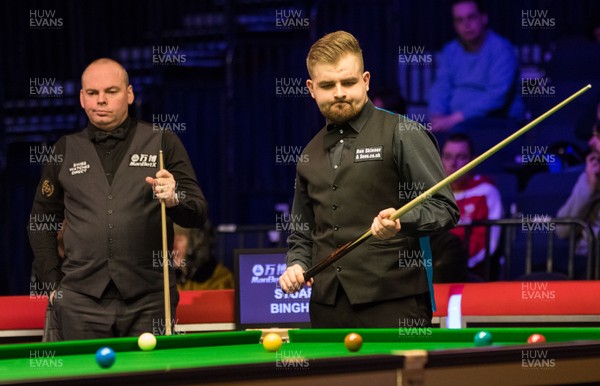 280218 - Welsh Open Snooker, Motorpoint Arena, Cardiff - Jackson Page contemplates his shot during his  second round match against Stuart Bingham