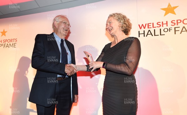 260619 - Welsh Sport Hall of Fame - Steve Williams is presented with the Lord Brookes Award for Outstanding Services to Welsh Sport award by Professor Leigh Robinson
