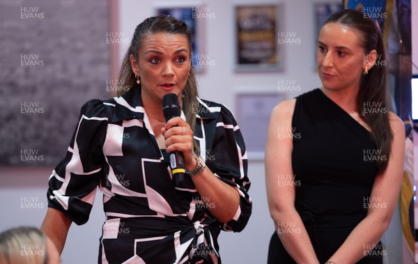 140923 - Welsh Sports Hall of Fame Dinner, Cardiff City Stadium - Nia Jones speaks as her team mate, Welsh netball star Suzy Drane, is inducted into the Welsh Sports Hall of Fame