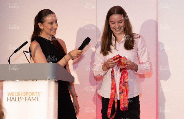 140923 - Welsh Sports Hall of Fame Dinner, Cardiff City Stadium - Swimmer Theodora Taylor chats with Molly Stephens