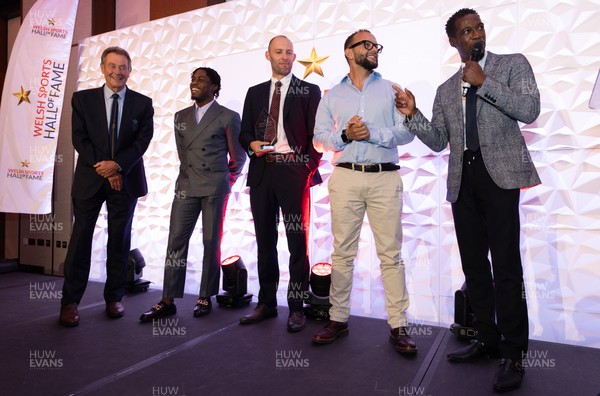 231025 - Welsh Sports Hall of Fame Awards Dinner, Parkgate Hotel, Cardiff - Left to right, Lynn Davies, Jeremian Azu, Dai Greene, Jamie Baulch and Christian Malcom
