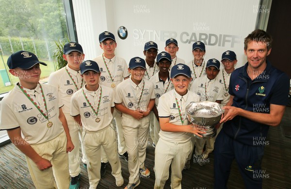 110817 - Welsh Clubs U15 Cup Final - Jac Kennedy, captain of Northop Hall U15 recieves the trophy from Glamorgan capatin Michael Hogan