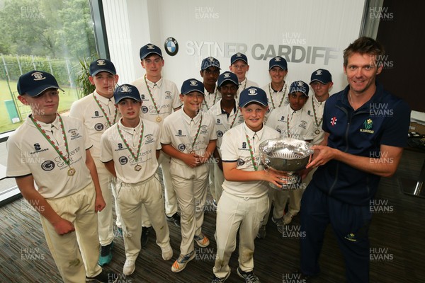 110817 - Welsh Clubs U15 Cup Final - Jac Kennedy, captain of Northop Hall U15 recieves the trophy from Glamorgan capatin Michael Hogan