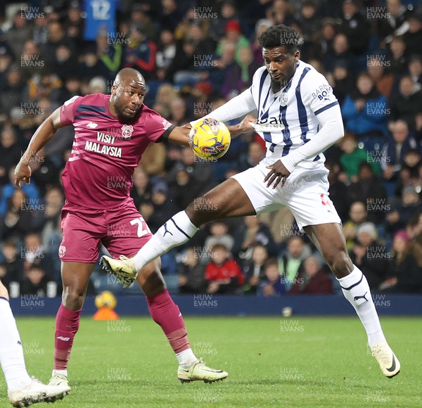 130224 - West Bromwich Albion v Cardiff City - Sky Bet Championship - Yakou Meite of Cardiff tries to head in a goal but is thwarted by Cedric Kipre of West Bromwich Albion