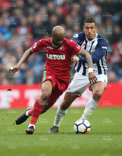 070418 - West Bromwich Albion v Swansea City, Premier League - Andre Ayew of Swansea City takes on Jake Livermore of West Bromwich Albion