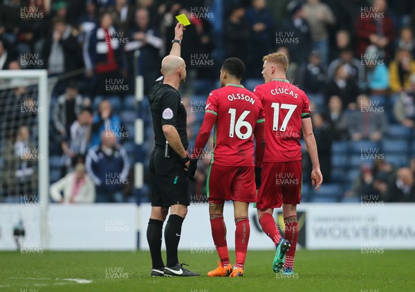070418 - West Bromwich Albion v Swansea City, Premier League -Sam Clucas of Swansea City is shown a yellow card after he argues with the referee after West Brom score