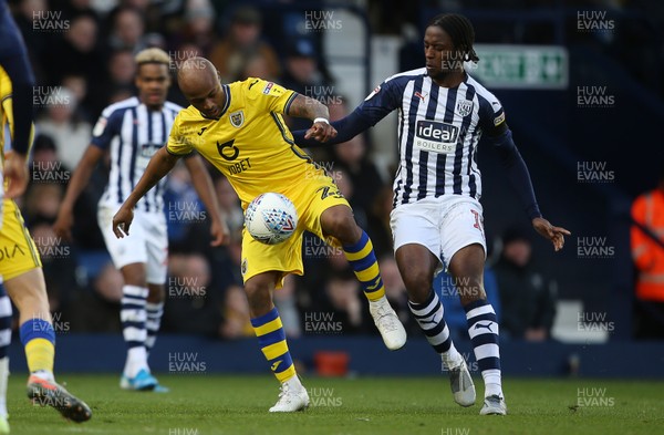 081219 - West Bromwich Albion v Swansea City - SkyBet Championship - Andre Ayew of Swansea City is challenged by Rekeem Harper of West Bromwich Albion