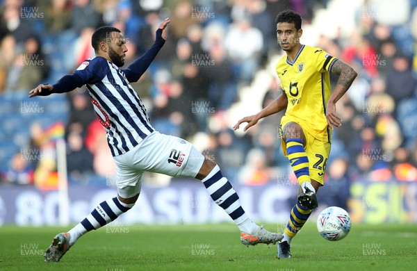 081219 - West Bromwich Albion v Swansea City - SkyBet Championship - Kyle Naughton of Swansea City is tackled by Matt Phillips of West Bromwich Albion