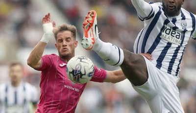 120823 - West Bromwich Albion v Swansea City - Sky Bet Championship - Jerry Yates of Swansea and Cedric Kipre of West Bromwich Albion