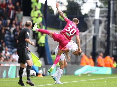 120823 - West Bromwich Albion v Swansea City - Sky Bet Championship - Harrison Ashby falls over Conor Townsend of West Bromwich Albion in 2nd half