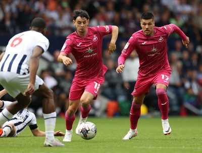 120823 - West Bromwich Albion v Swansea City - Sky Bet Championship - Joel Piroe of Swansea and Charlie Patino of Swansea chase the ball