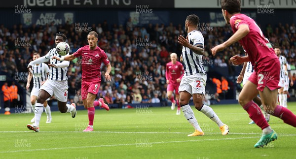 120823 - West Bromwich Albion v Swansea City - Sky Bet Championship - Joshua Key  of Swansea heads to goal and the feet of Jerry Yates of Swansea covered by Cedric Kipre of West Bromich Albion