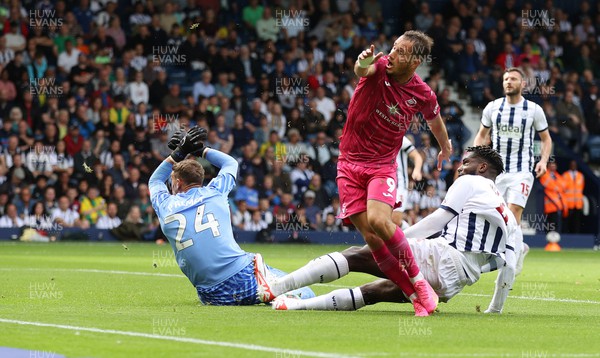 120823 - West Bromwich Albion v Swansea City - Sky Bet Championship - Joshua Key  of Swansea heads to goal and the feet of Jerry Yates of Swansea covered by Cedric Kipre of West Bromich Albion but saved by Goalkeeper Alex Palmer of West Bromich Albion