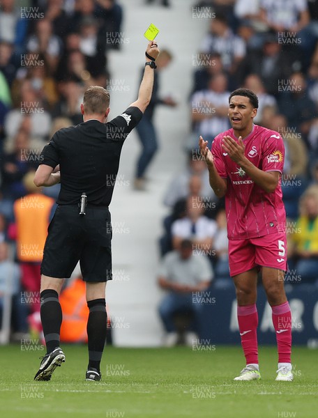 120823 - West Bromwich Albion v Swansea City - Sky Bet Championship - Ben Cabango of Swansea gets a yellow in the 2nd half from referee Samuel Barrott