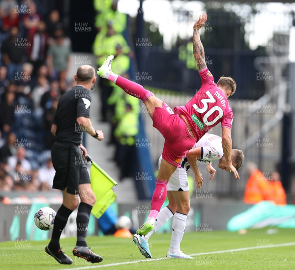 120823 - West Bromwich Albion v Swansea City - Sky Bet Championship - Harrison Ashby falls over Conor Townsend of West Bromwich Albion in 2nd half