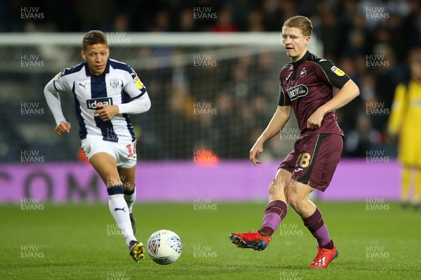 130319 - West Bromwich Albion v Swansea City - SkyBet Championship - George Byers of Swansea City is challenged by Dwight Gayle of West Bromwich Albion