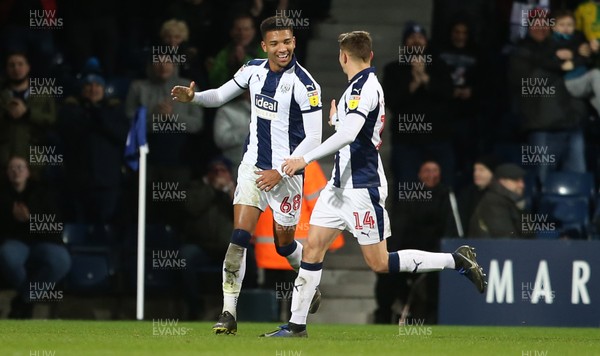 130319 - West Bromwich Albion v Swansea City - SkyBet Championship - Mason Holgate of West Bromwich Albion celebrates scoring a goal with Conor Townsend