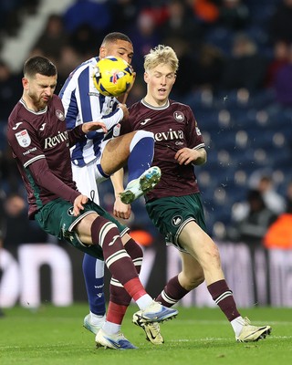 291125 - West Bromwich Albion v Swansea City - Sky Bet Championship - Zan Vipotnik of Swansea and Melker Widell of Swansea tackle George Campbell of WBA