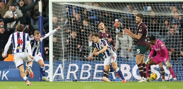 291125 - West Bromwich Albion v Swansea City - Sky Bet Championship - WBA team celebrate as Cameron Burgess of Swansea and Goalkeeper Lawrence Vigouroux of Swansea despair