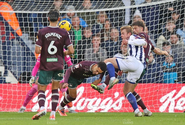 291125 - West Bromwich Albion v Swansea City - Sky Bet Championship - Cameron Burgess of Swansea and Ben Cabango of Swansea try to block Aune Heggebe of WBA from scoring