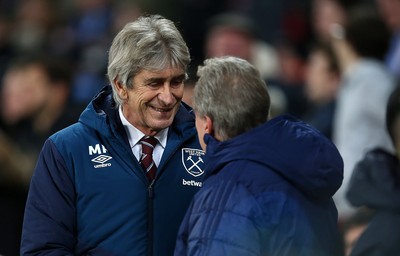 041218 - West Ham United v Cardiff City - Premier League - West Ham Manager Manuel Pellegrini and Cardiff City Manager Neil Warnock