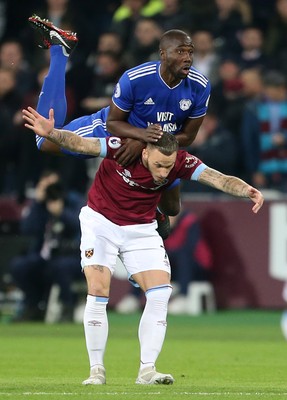 041218 - West Ham United v Cardiff City - Premier League - Souleymane Bamba of Cardiff City gets over Marko Arnautovic of West Ham