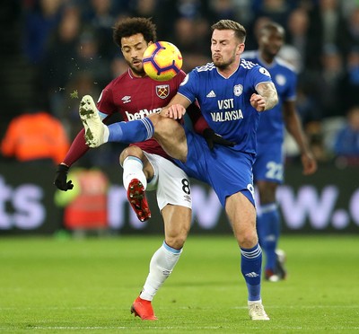 041218 - West Ham United v Cardiff City - Premier League - Felipe Anderson of West Ham is tackled by Joe Ralls of Cardiff City