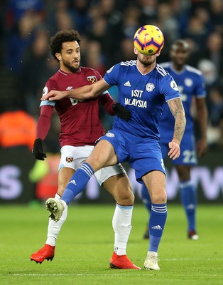 041218 - West Ham United v Cardiff City - Premier League - Felipe Anderson of West Ham is tackled by Joe Ralls of Cardiff City