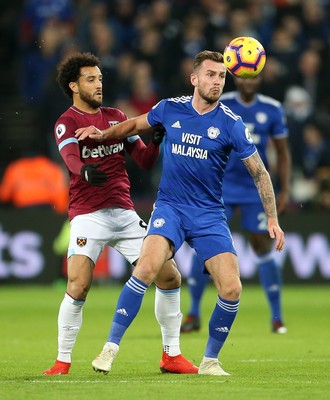 041218 - West Ham United v Cardiff City - Premier League - Felipe Anderson of West Ham is tackled by Joe Ralls of Cardiff City