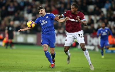 041218 - West Ham United v Cardiff City - Premier League - Callum Paterson of Cardiff City is challenged by Issa Diop of West Ham