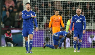 041218 - West Ham United v Cardiff City - Premier League - Dejected Sean Morrison and Aron Gunnarsson of Cardiff City