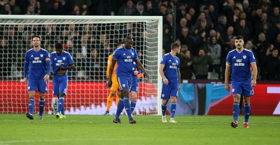 041218 - West Ham United v Cardiff City - Premier League - Dejected Sean Morrison, Souleymane Bamba, Joe Ralls and Callum Paterson of Cardiff City