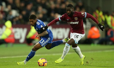 041218 - West Ham United v Cardiff City - Premier League - Kadeem Harris of Cardiff City is tackled by Arthur Masuaku of West Ham