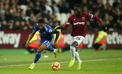 041218 - West Ham United v Cardiff City - Premier League - Kadeem Harris of Cardiff City is tackled by Arthur Masuaku of West Ham