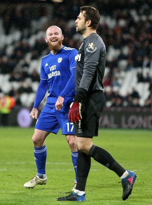 041218 - West Ham United v Cardiff City - Premier League - Aron Gunnarsson of Cardiff City teases Lukasz Fabianski of West Ham after Cardiff score in injury time to make the final score 3-1