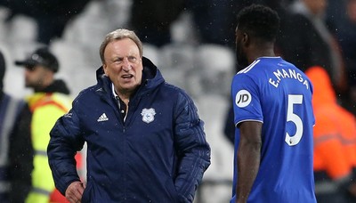 041218 - West Ham United v Cardiff City - Premier League - Cardiff City Manager Neil Warnock talks to Bruno Ecuele Manga of Cardiff City at full time