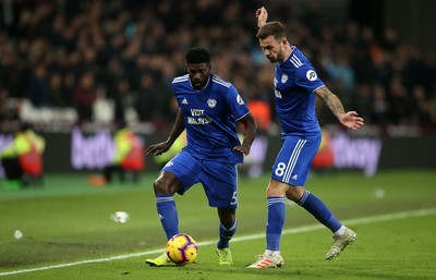 041218 - West Ham United v Cardiff City - Premier League - Bruno Ecuele Manga and Joe Ralls of Cardiff City