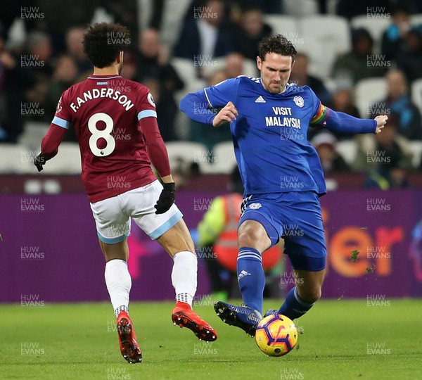 041218 - West Ham United v Cardiff City - Premier League - Sean Morrison of Cardiff City is challenged by Felipe Anderson of West Ham
