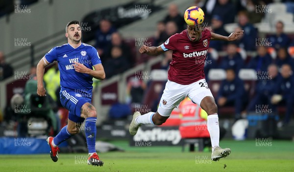 041218 - West Ham United v Cardiff City - Premier League - Issa Diop of West Ham gets to the ball quicker than Callum Paterson of Cardiff City