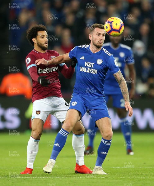 041218 - West Ham United v Cardiff City - Premier League - Felipe Anderson of West Ham is tackled by Joe Ralls of Cardiff City