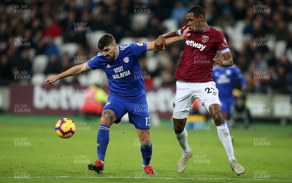 041218 - West Ham United v Cardiff City - Premier League - Callum Paterson of Cardiff City is challenged by Issa Diop of West Ham